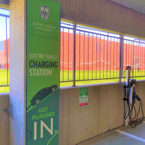 Electric vehicle charging station in parking garage at Saint Louis University